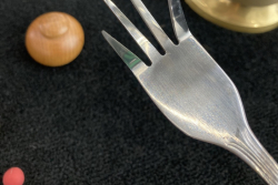 Shell games and fork bending are two trade fair attractions at K in Düsseldorf.